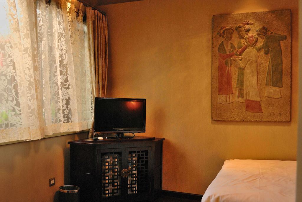Graceland Yard Hotel Peking Szoba fotó
